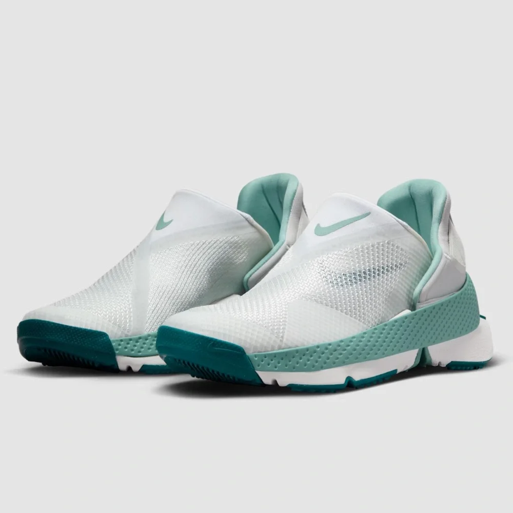 Nike Women’s Slip-On Sneakers in White and Teal